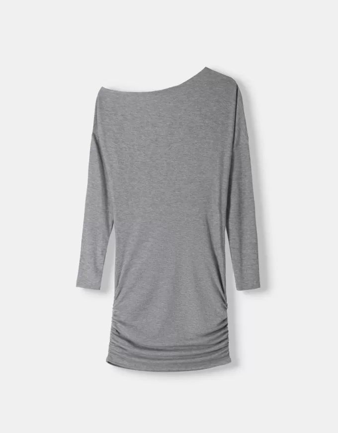 Abito asimmetrico a maniche lunghe