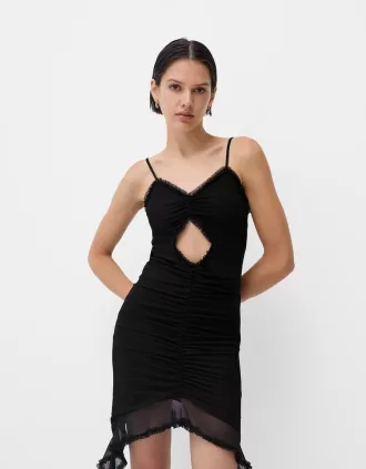 Abito in tulle con spalline e volant