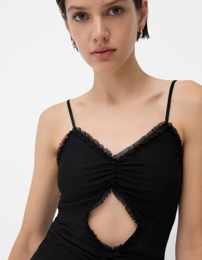 Abito in tulle con spalline e volant