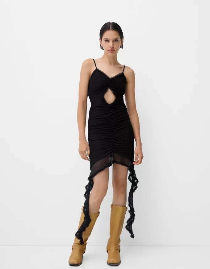 Abito in tulle con spalline e volant