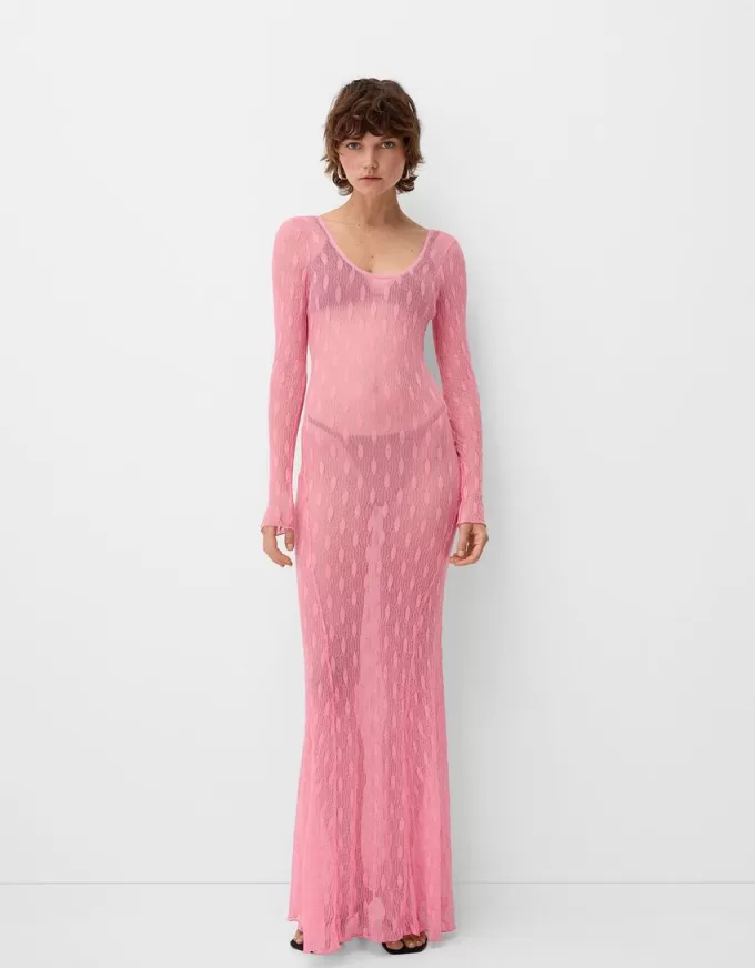 Abito lungo in pizzo con schiena scoperta