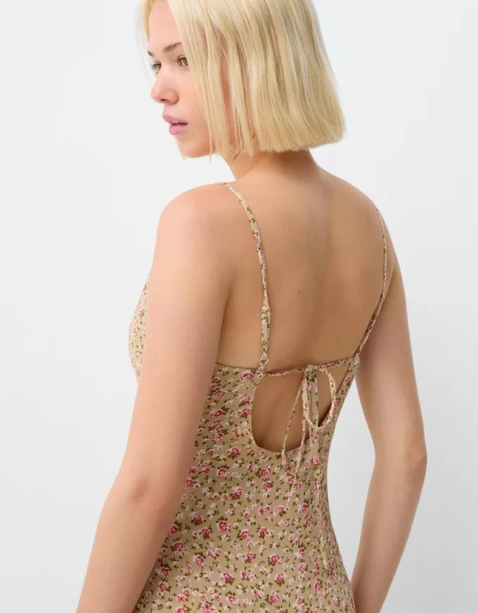 Abito midi in crêpe stampato con volant