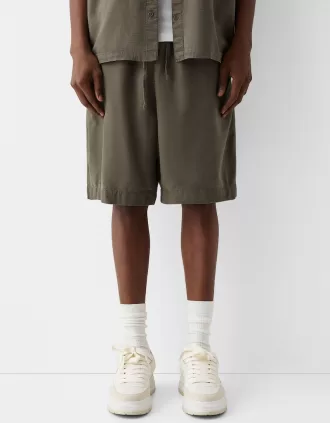 Bermuda rustici a gamba larga