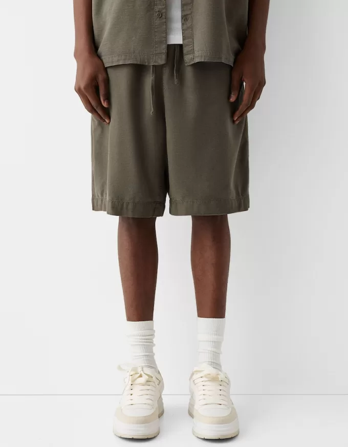 Bermuda rustici a gamba larga