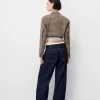 Blazer cropped con orlo sfrangiato
