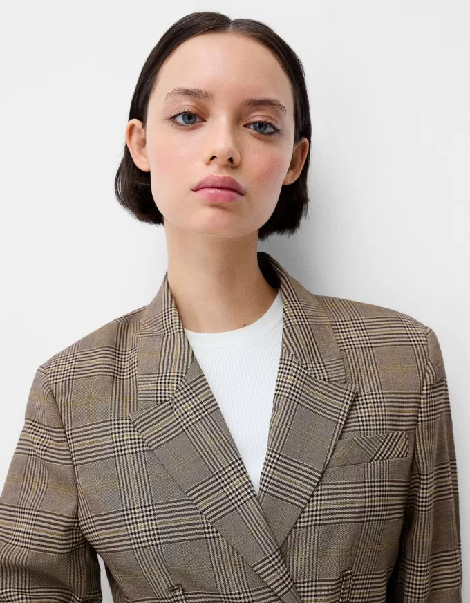 Blazer cropped con orlo sfrangiato