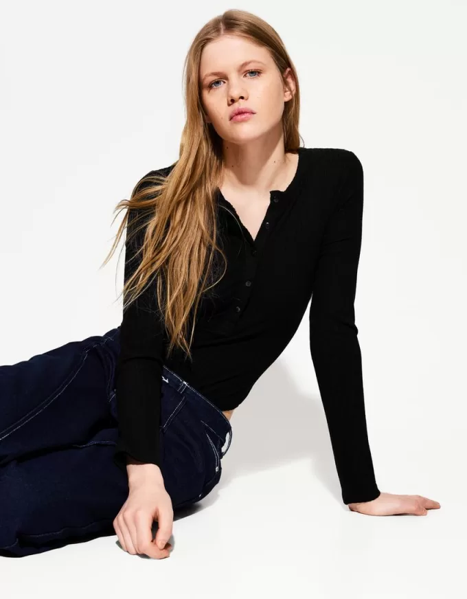 Body a maniche lunghe con bottoni