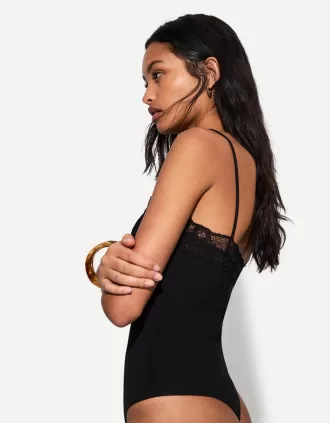 Body in pizzo biondo con spalline