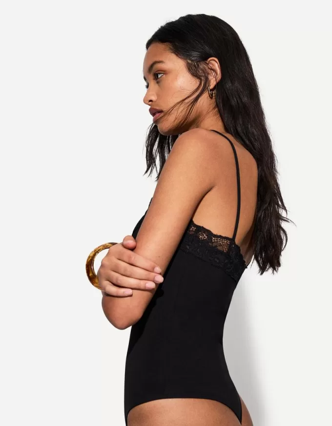 Body in pizzo biondo con spalline