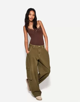 Body in pizzo biondo con spalline