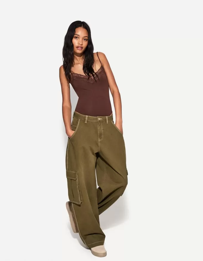 Body in pizzo biondo con spalline