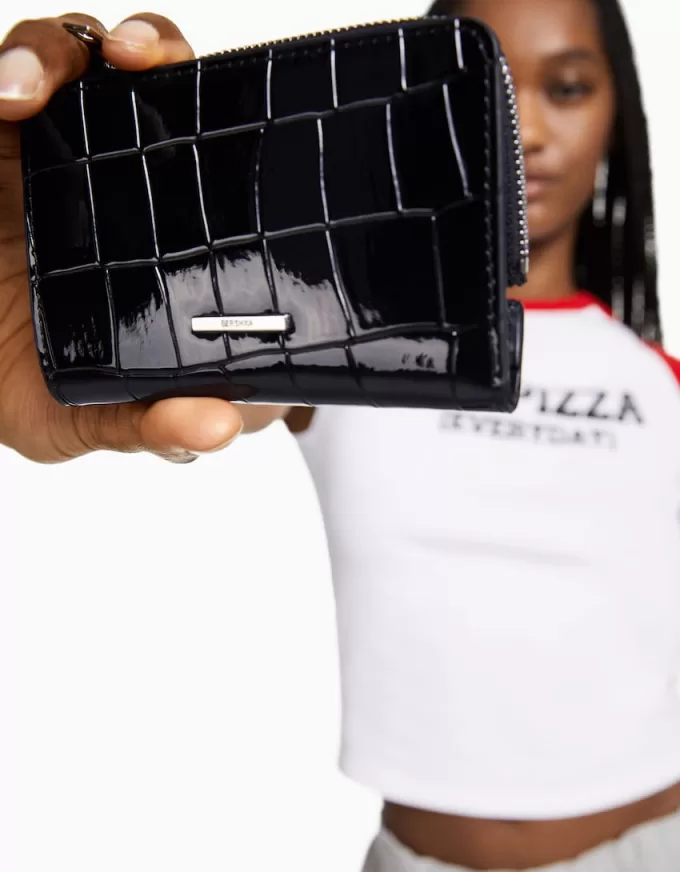 Borsa con stampa animalier con finitura in finta vernice goffrata