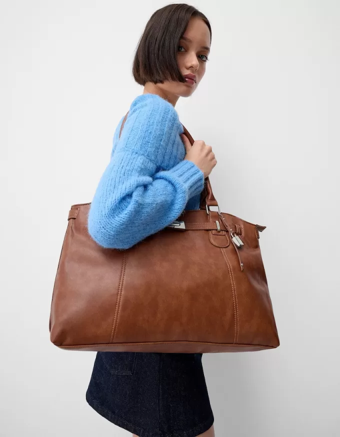 Borsa effetto pelle con perline