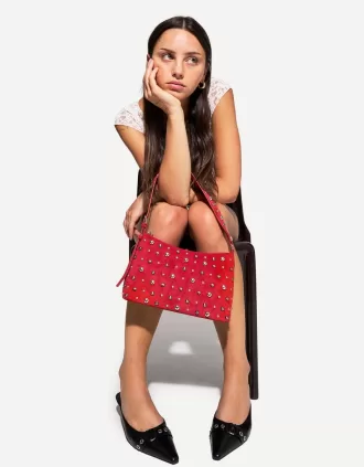 Borsa in finta pelle scamosciata borchiata