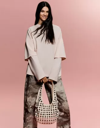 Borsa in finta pelle scamosciata borchiata