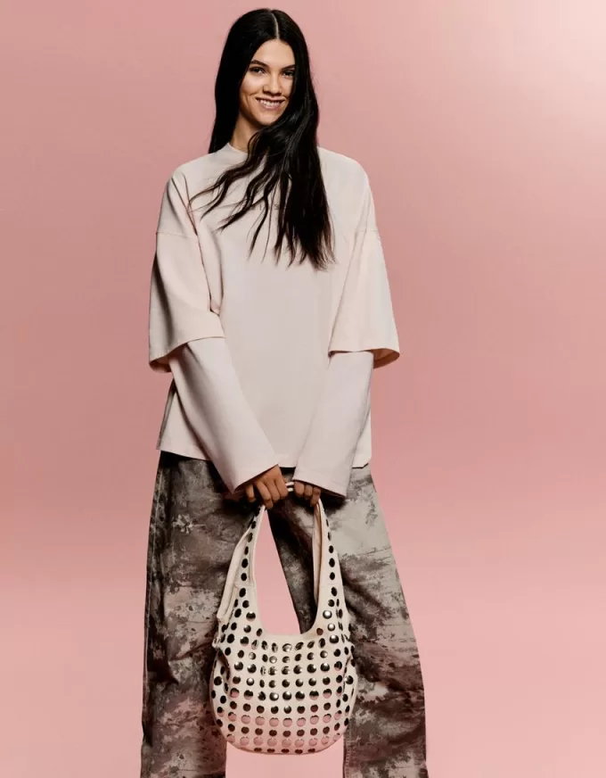 Borsa in finta pelle scamosciata borchiata