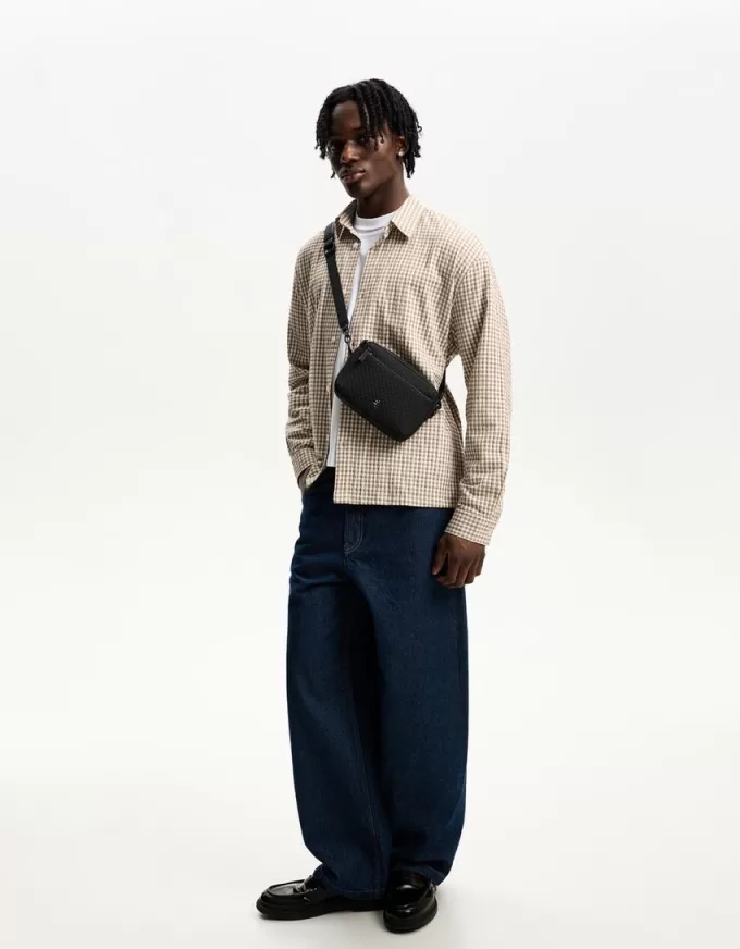 Borsa messenger con monogramma gommato