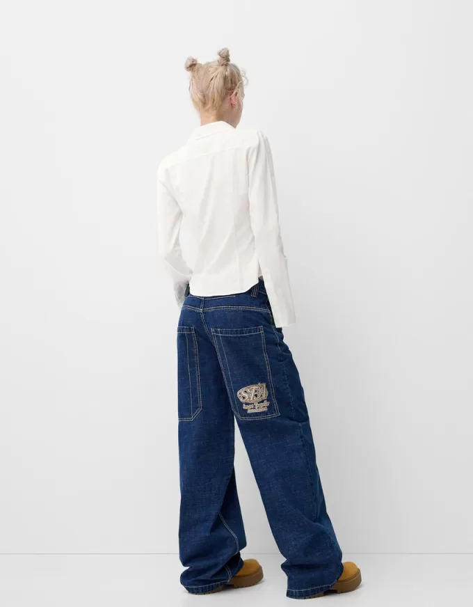 Camicia aderente con maniche svasate