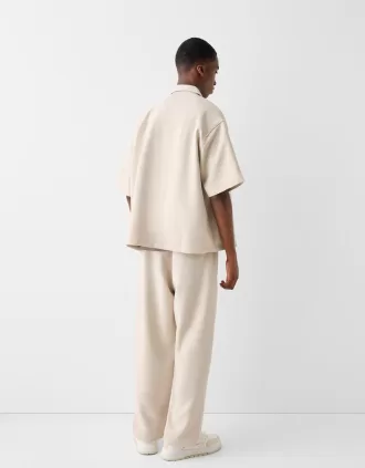 Camicia sartoriale dal taglio squadrato a maniche corte