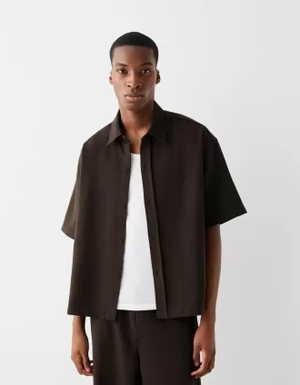 Camicia sartoriale dal taglio squadrato a maniche corte