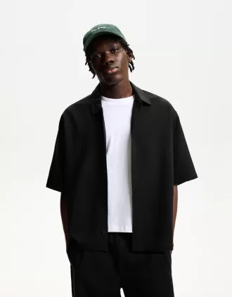 Camicia sartoriale dal taglio squadrato a maniche corte