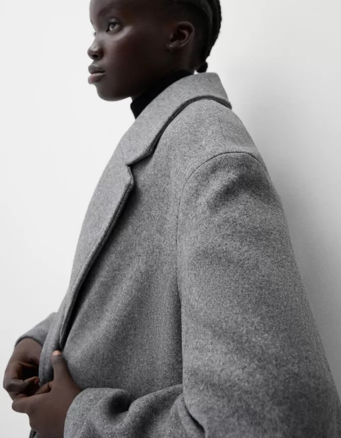 Abito midi testurizzato aderente Abito midi testurizzato aderente