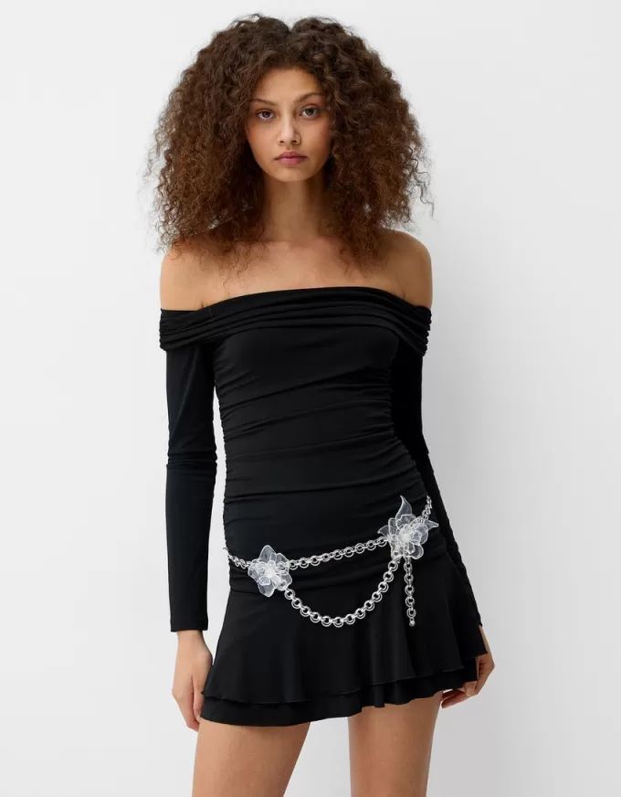 Cintura a catena con fiori trasparenti