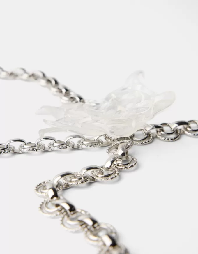 Cintura a catena con fiori trasparenti