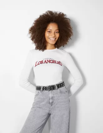 Cintura in ecopelle con occhielli