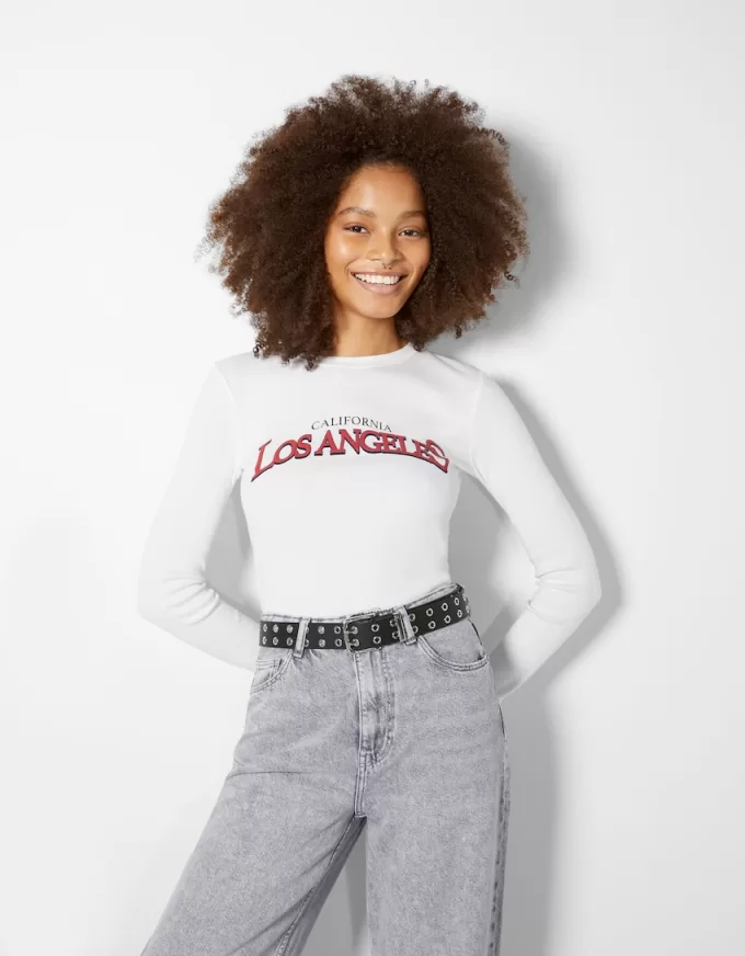 Cintura in ecopelle con occhielli