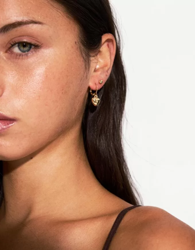 Confezione da 12 orecchini con finitura madreperla