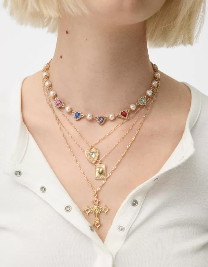 Confezione da 4 collane con croce di strass