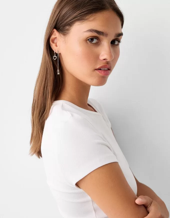 Confezione da 9 orecchini a stella con strass