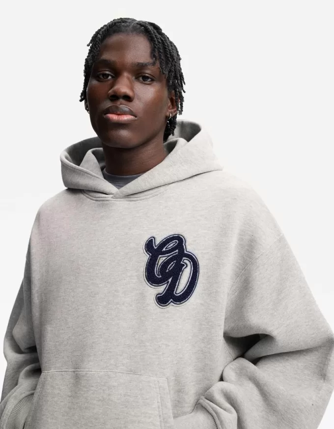 Felpa con cappuccio dalla vestibilità squadrata stampata