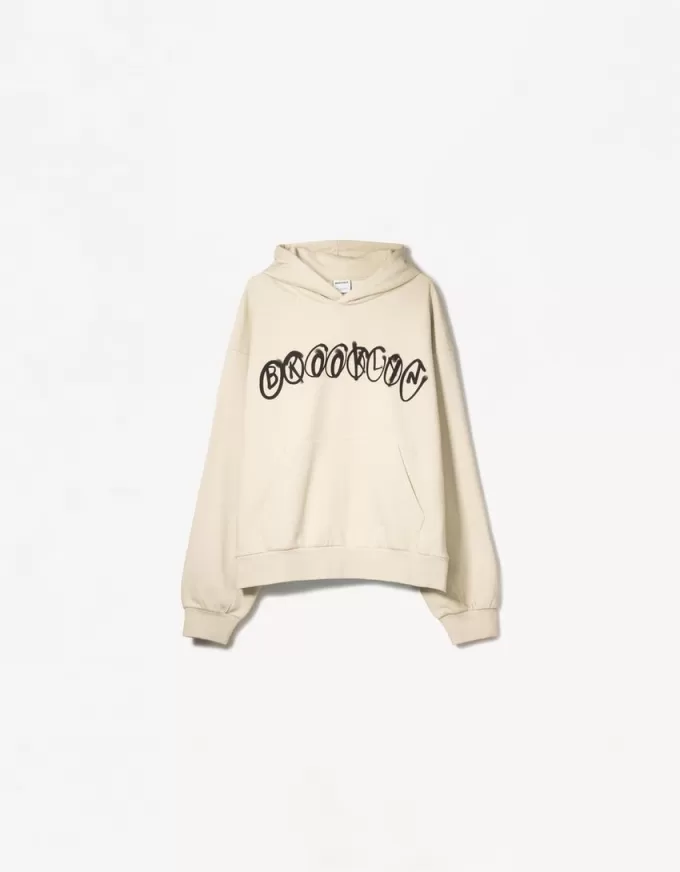 Felpa con cappuccio dalla vestibilità squadrata stampata