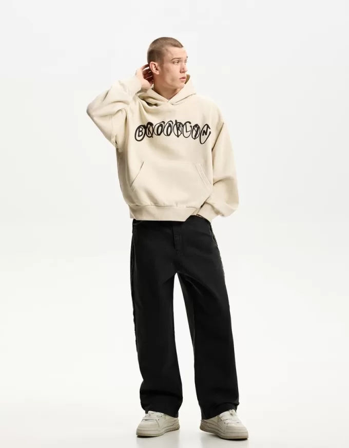 Felpa con cappuccio dalla vestibilità squadrata stampata