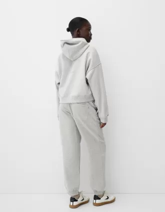 Felpa con cappuccio in peluche