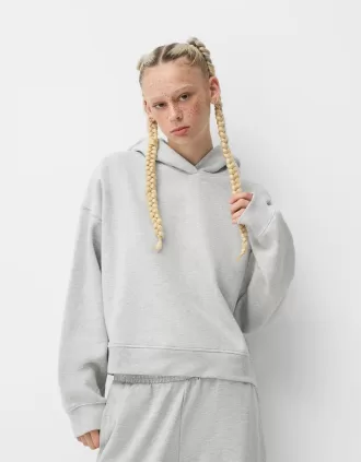 Felpa con cappuccio in peluche