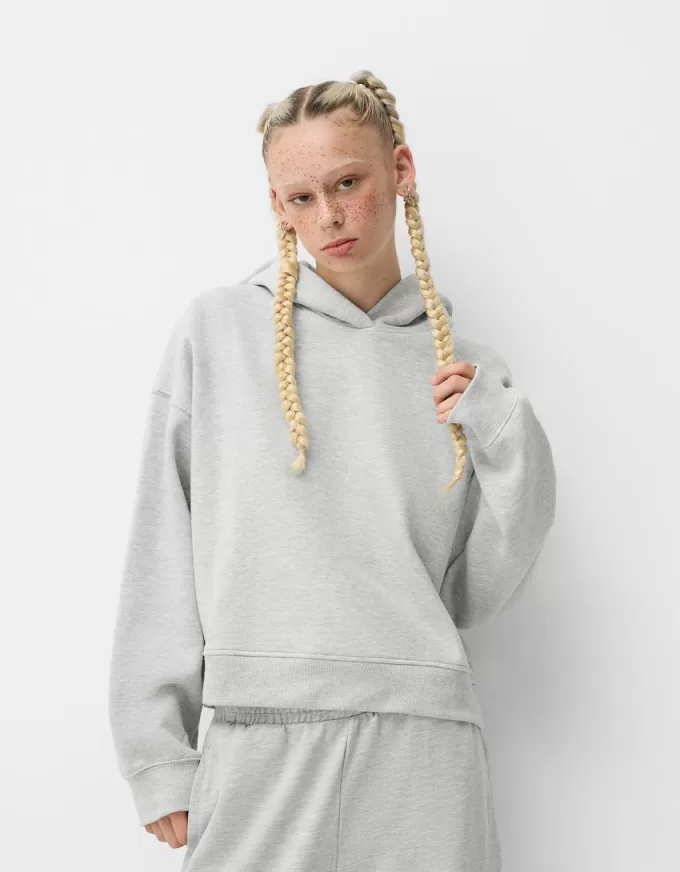 Felpa con cappuccio in peluche