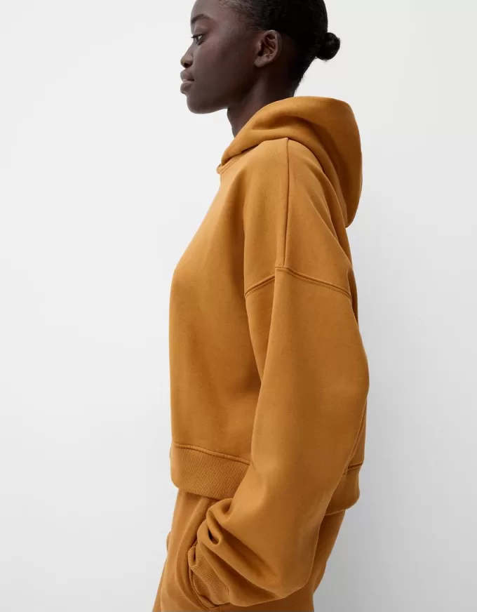 Felpa con cappuccio in peluche