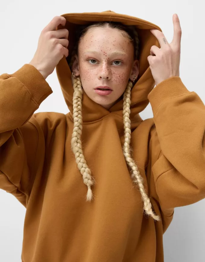 Felpa con cappuccio in peluche