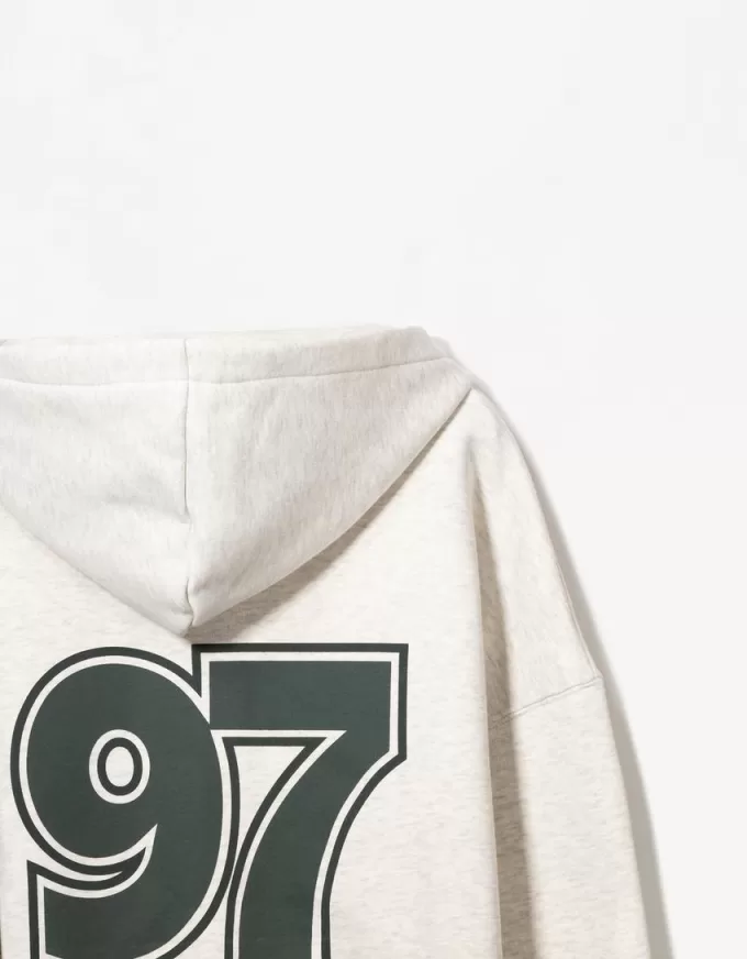 Felpa con cappuccio stampata con zip