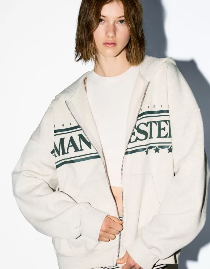 Felpa con cappuccio stampata con zip