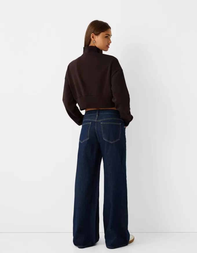 Felpa con zip e ricamo