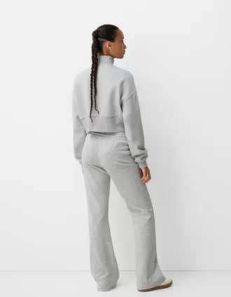 Felpa con zip e ricamo