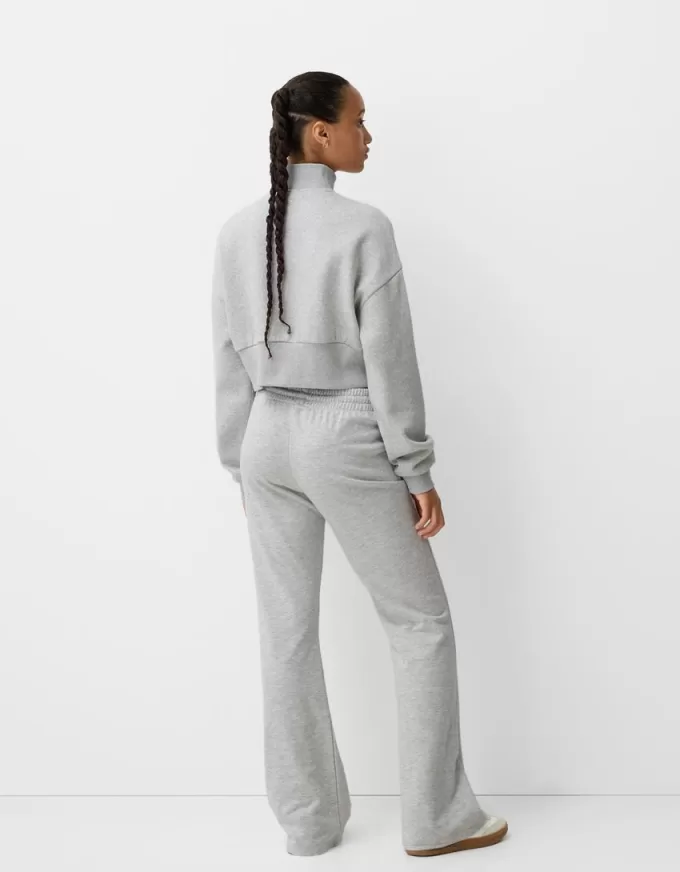 Felpa con zip e ricamo