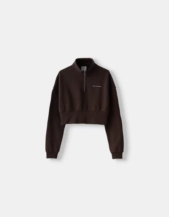 Felpa con zip e ricamo