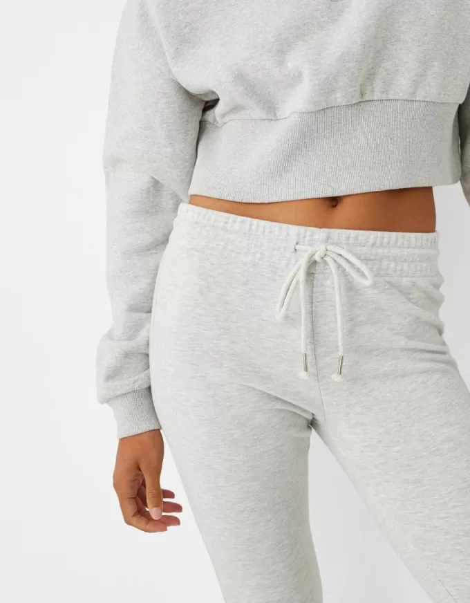 Felpa con zip e ricamo