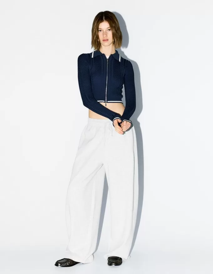 Giacca con zip e colletto polo lavorato a trecce