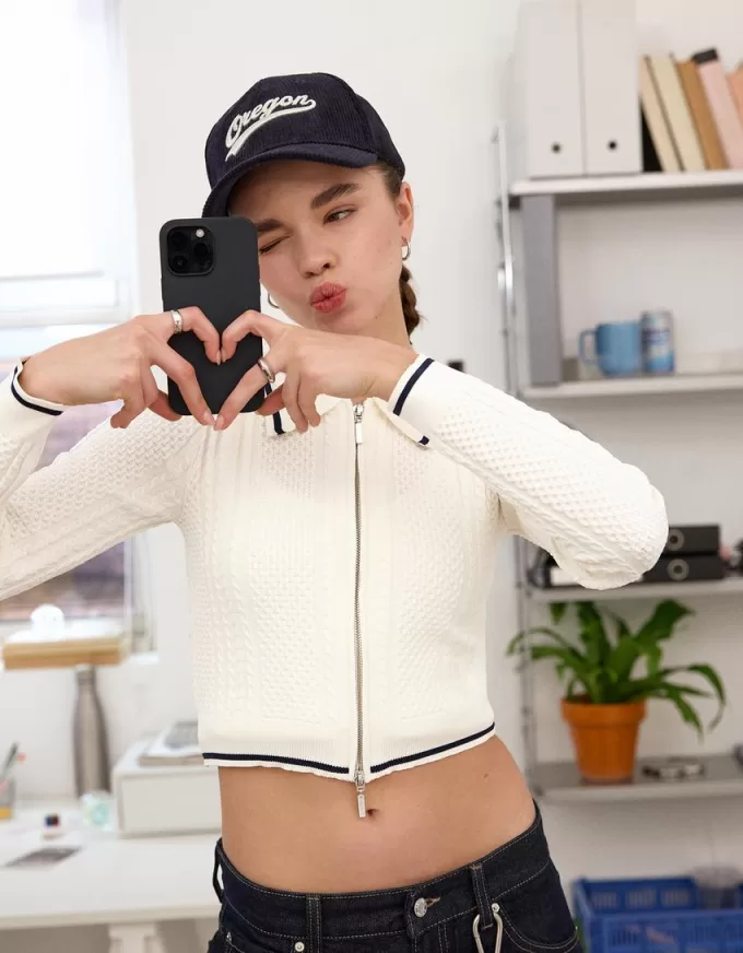 Giacca con zip e colletto polo lavorato a trecce